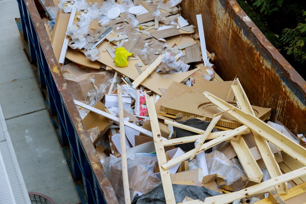 construction trash dumpsters in an metal container, home house renovation.
